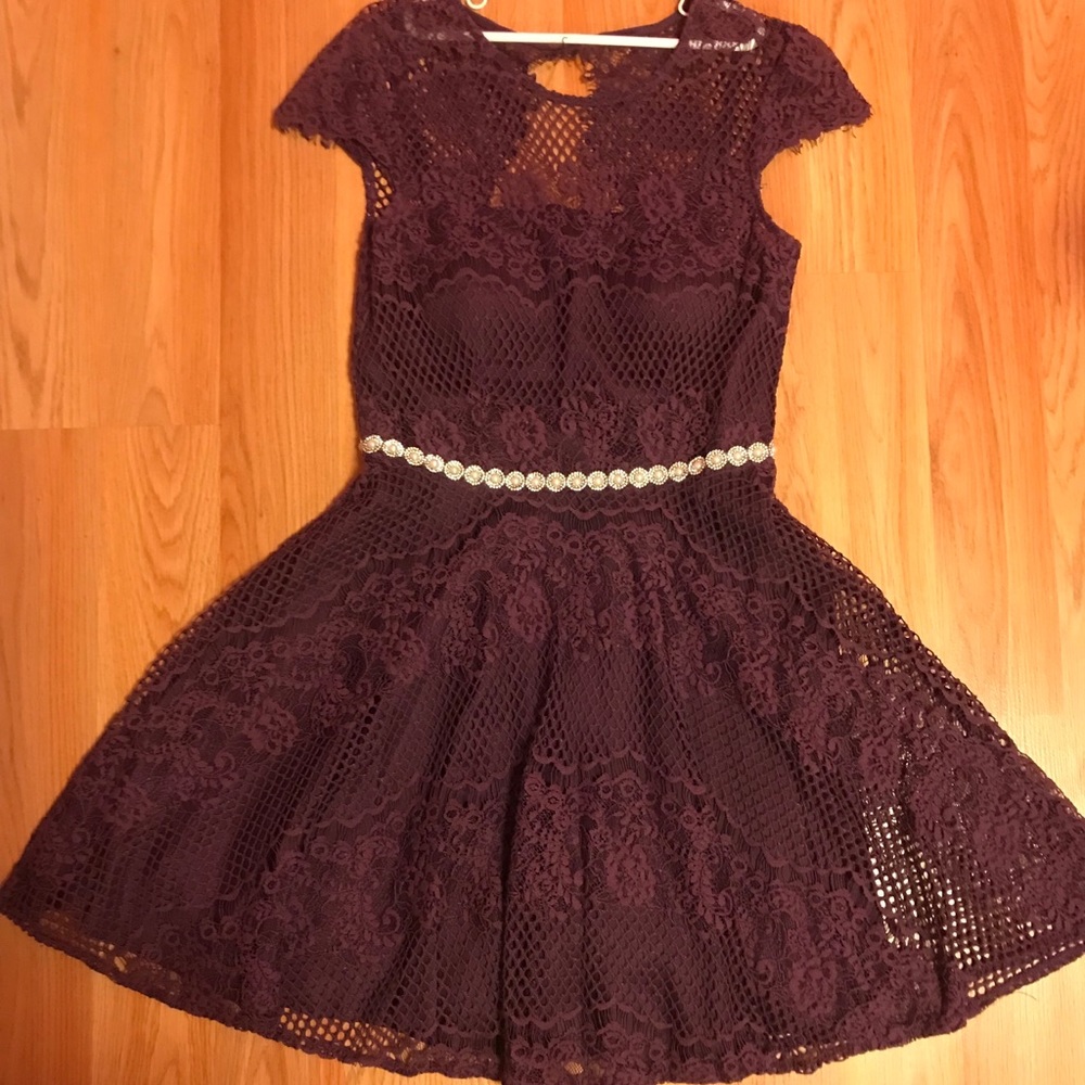 Purple lace midi dress with a pearl beaded bodice.
